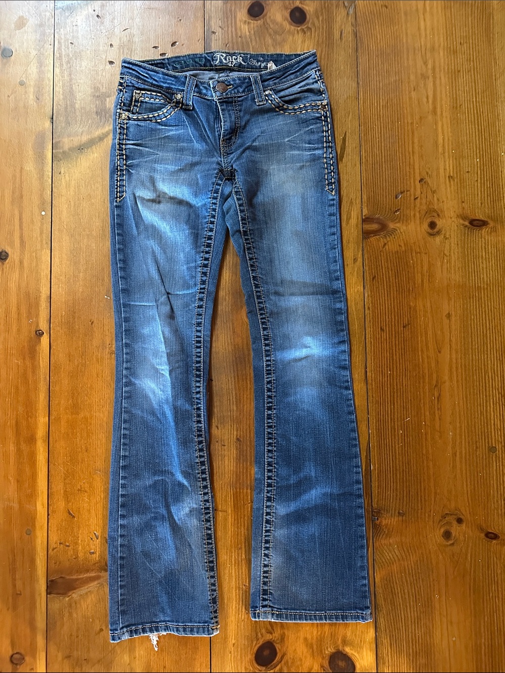 Women’s Blue Bootcut Jeans - Wrangler Rock 47. Ultra low rise